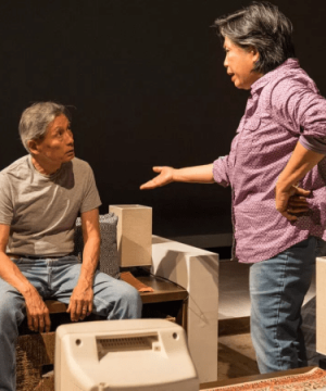 Two actors arguing on stage in the play Saggitarius Ponderosa
