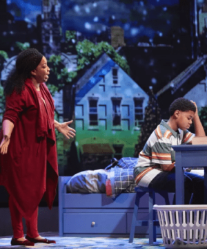 An African-American mother talks to her son for the play Black Super Hero Magic Mama for TRW Plays