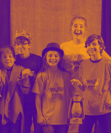 A group of Youth Theater kids on stage for TRW Plays